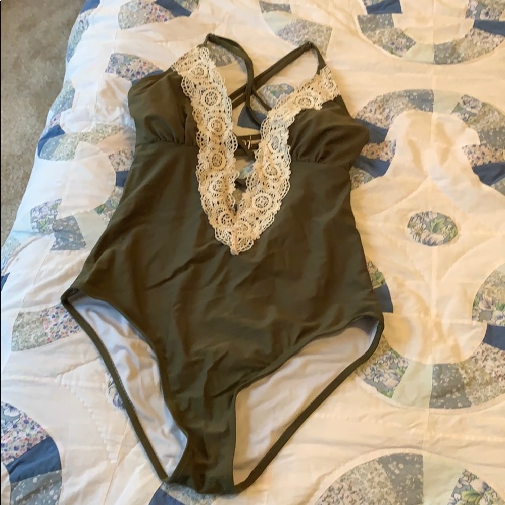 Green one piece lace swim suite